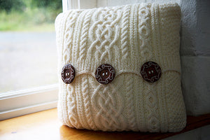 Aran-Knit Wool Cushions in Cream by Geraldine Gildernew