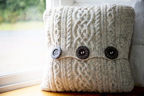 Aran-Knit Wool Cushions in Cream, Grey by Geraldine Gildernew
